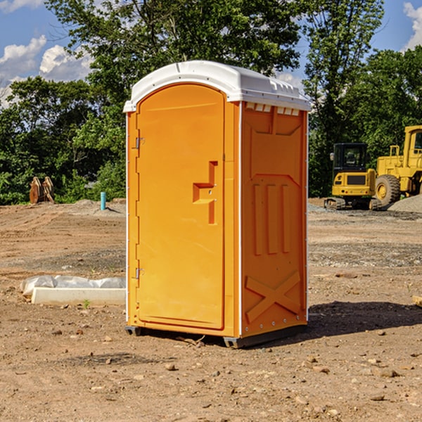 how often are the portable restrooms cleaned and serviced during a rental period in Coburg OR